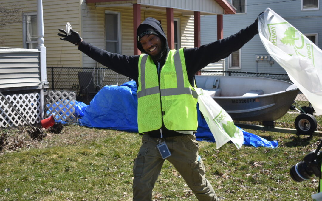 a happy clean-up volunteer